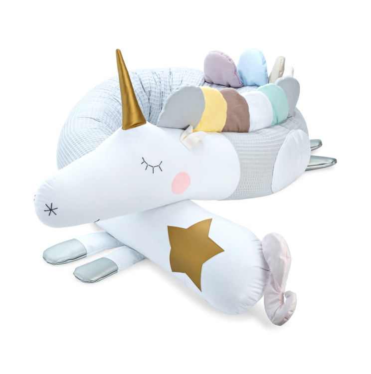 long gray unicorn-shaped cuddle pillow, wall protector for a baby bed, cuddlerest.jpg