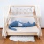 cotton bed bumper from cuddlerest, blue dragonsaur.jpg
