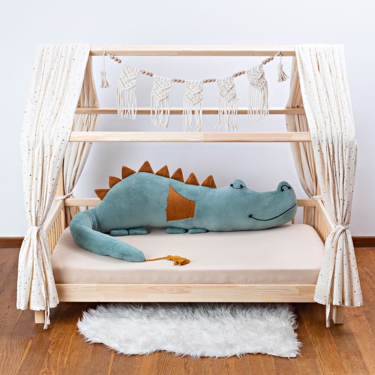 plush bed bumper from cuddlerest, green dragonsaur.jpg