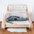 cotton bed bumper from cuddlerest, sage-green dragonsaur.jpg